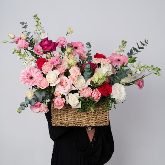 Pink Pearl flower basket featuring fresh flowers, handcrafted by a flower shop in Dubai