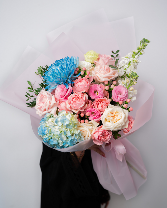 Pastel candy flower bouquet from a flower shop in Dubai with soft pink and pastel blooms