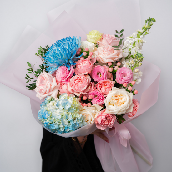 Pastel candy flower bouquet arranged by a premium flower shop in Dubai