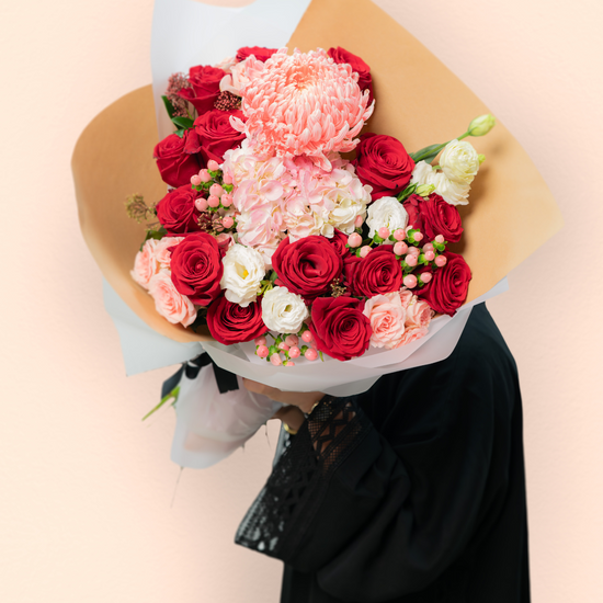 Radiant Rouge flower bouquet with rich red blooms and elegant flower shop JLT