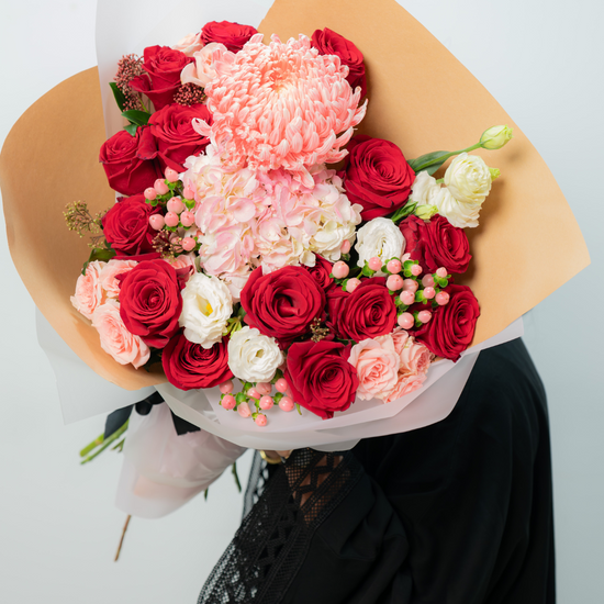 Radiant Rouge flower bouquet arranged by a flower shop in JLT